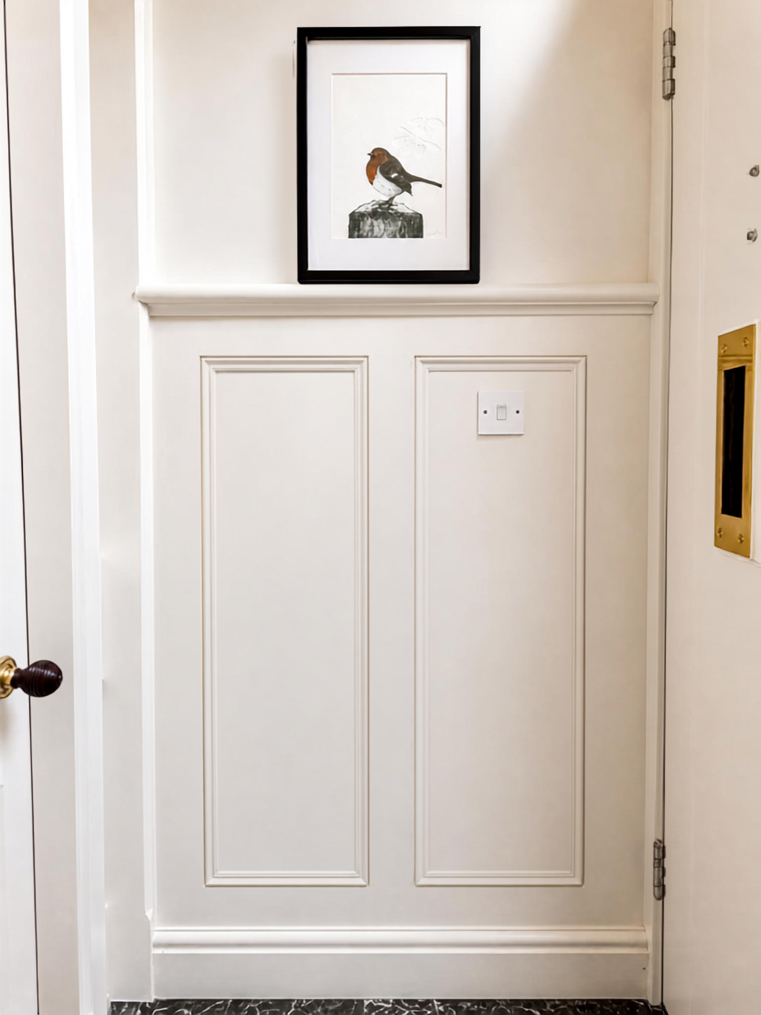 White panelled vestibule